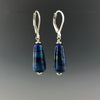 Side view showing opening of the leverbacks with sterling silver saucer beads and tapered cone cobalt blue dangle earrings.