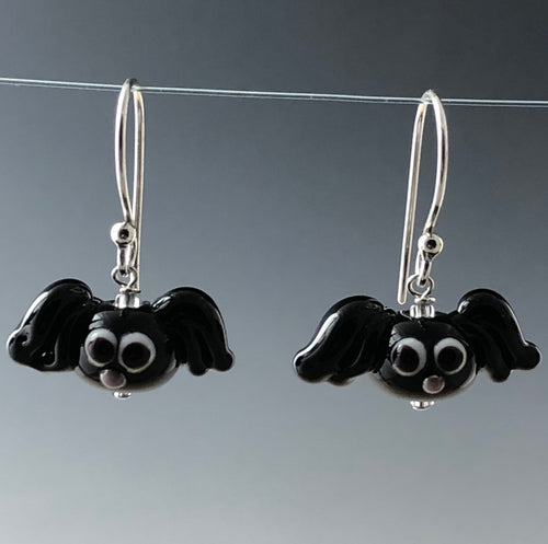 Cute small glass black bats with black/white eyes and purple noses.  They hang from simple sterling silver earrwires.  Zoom ready earrings! Happy Halloween!