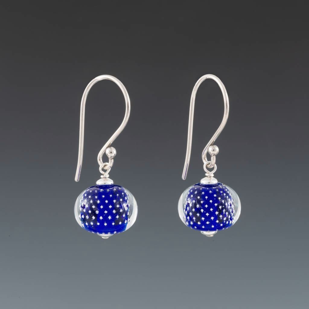 Cobalt Blue Sparkling Earrings (Ear Wires) by Becky Congdon are handmade glass beads in cobalt blue with tiny silver balls encased with clear. Each bead dangles from simple Bali silver ear wires with tiny silver saucer beads on either side of the glass bead.